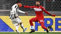 Juventus' Spanish forward Alvaro Morata (L) misses a goal opportunity against Fiorentina's Polish goalkeeper Bartlomiej Dragowski during the Italian Cup (Coppa Italia) semifinal, second leg football match between Juventus and Fiorentina on April 20, 2022 at the Juventus stadium in Turin. (Photo by Marco BERTORELLO / AFP) (Photo by MARCO BERTORELLO/AFP via Getty Images)