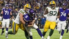 MINNEAPOLIS, MN - NOVEMBER 25: Kirk Cousins #8 of the Minnesota Vikings is tackled with the ball by Blake Martinez #50 of the Green Bay Packers third quarter of the game at U.S. Bank Stadium on November 25, 2018 in Minneapolis, Minnesota.   Stephen Mature