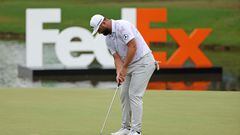 Jon Rahm of Spain putts on the 18th green during the first round of the FedEx St. Jude Championship