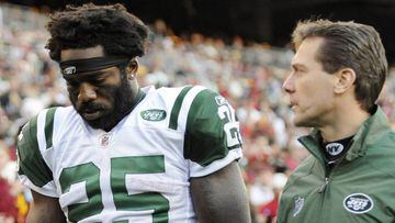 New York Jets running back Joe McKnight leaves the field after an injury