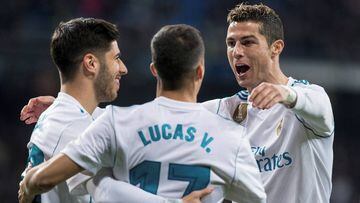 Marco Asensio, Lucas V&aacute;zquez y Cristiano Ronaldo celebran un gol a la Real Sociedad.
