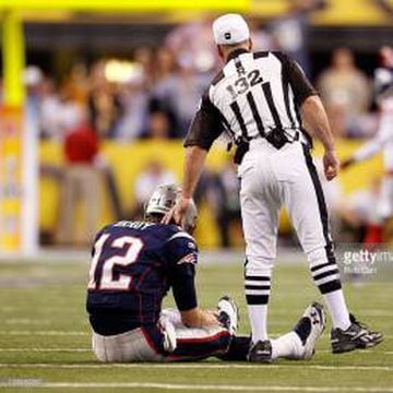 Referee John Parry (132) looks at a replay on the sidelines during the  first half of an NFL preseason football game between the Detroit Lions and  the New England Patriots, Friday, Aug.