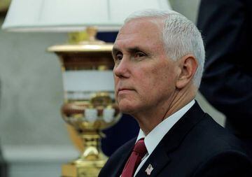 FILE PHOTO: U.S. Vice President Mike Pence LISTENS during U.S. President Donald Trump's meeting with Iraq's Prime Minister Mustafa al-Kadhimi in the Oval Office at the White House in Washington, U.S., August 20, 2020. REUTERS/Carlos Barria/File Photo