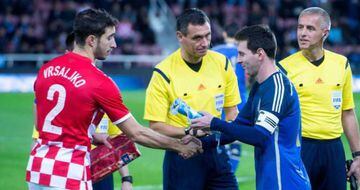Vrsalko y Messi en un partido internacional.
