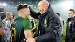 Dec 4, 2021; Portland, Oregon, USA; Portland Timbers head coach Giovanni Savarese celebrates with forward Felipe Mora (9) after beating Real Salt Lake to win the Western Conference Finals of the 2021 MLS Playoffs at Providence Park. Mandatory Credit: Troy
