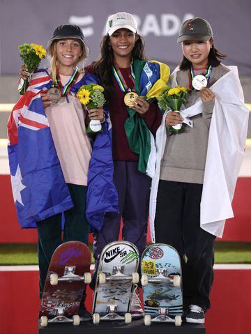 SHARJAH, UNITED ARAB EMIRATES - FEBRUARY 05: (L-R) Second placed Chloe Covell of Australia, winner Rayssa Leal of Brazil and third placed Momiji Nishiya of Japan celebrate on the podium after the Women's Street Final during the Sharjah Skateboarding Street and Park World Championships 2023on February 05, 2023 in Sharjah, United Arab Emirates. (Photo by Francois Nel/Getty Images)