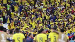 Ecuador supporters celebrate after their team won the Qatar 2022 World Cup Group A football match against Qatar at the Al-Bayt Stadium in Al Khor, north of Doha on November 20, 2022. (Photo by KARIM JAAFAR / AFP)