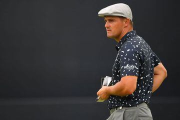 (FILES) This file photo taken on July 15, 2021 shows US golfer Bryson DeChambeau on the 18th green during his first round on day one of The 149th British Open Golf Championship at Royal St George's, Sandwich in south-east England.