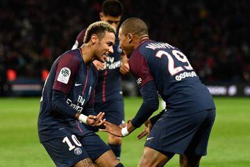 Another season of this | Paris Saint-Germain's Brazilian forward Neymar and French forward Kylian Mbappe celebrate.