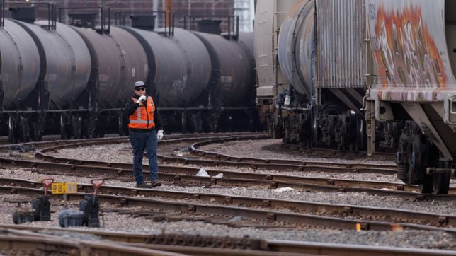 What is in the law signed by Biden to prevent the railroad workers’ strike?