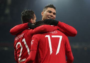 Manchester United's Fred celebrates with Casemiro and Antony.
