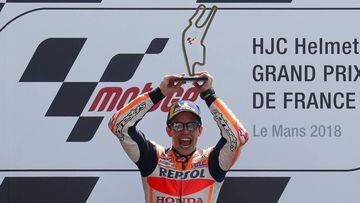 Motorcycling - MotoGP - French Grand Prix - Bugatti Circuit, Le Mans, France - May 20, 2018   Repsol Honda Team&#039;s Marc Marquez celebrates with a trophy after winning the race   REUTERS/Gonzalo Fuentes