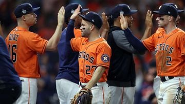 HOUSTON, TEXAS - OCTOBER 27: Jose Altuve #27 of the Houston Astros celebrates the 7-2 win with teammates against the Atlanta Braves in Game Two of the World Series at Minute Maid Park on October 27, 2021 in Houston, Texas.   Patrick Smith/Getty Images/AFP