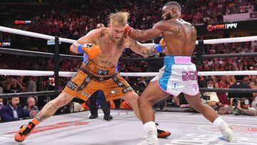 CLEVELAND, OHIO - AUGUST 29: Jake Paul fights Tyron Woodley in their cruiserweight bout during a Showtime pay-per-view event at Rocket Morgage Fieldhouse on August 29, 2021 in Cleveland, Ohio.   Jason Miller/Getty Images/AFP == FOR NEWSPAPERS, INTERNET, 