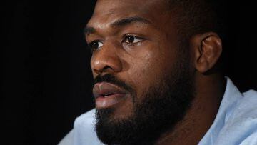 Mixed martial artist Jon Jones listens during a news conference at MGM Grand Hotel &amp; Casino.