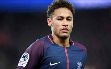 In this file photo taken on February 17, 2018 Paris Saint-Germain's Brazilian forward Neymar Jr looks on during the French Ligue 1 football match between Paris Saint-Germain (PSG) and Strasbourg at The Parc des Princes in Paris.
