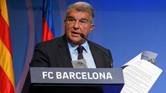 Barcelona's President Joan Laporta presents documents as he addresses a press conference at the Camp Nou stadium in Barcelona on April 17, 2023. - Barcelona have never "done anything" to "obtain some type of sporting advantage," the club's president Joan Laporta said amid investigations into payments made to a former refereeing chief. Laporta told that the allegations of wrongdoing were part of a "smear campaign" against the Catalan side who are currently top of La Liga. (Photo by LLUIS GENE / AFP)