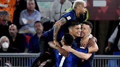 Inter Milan's Croatian midfielder Ivan Perisic (R) celebrates with Inter Milan's Argentine forward Joaquin Correa (C), Inter Milan's Chilean midfielder Arturo Vidal (Top) and Inter Milan's Chilean forward Alexis Sanchez after scoring a penalty during the Italian Cup (Coppa Italia) final football match between Juventus and Inter on May 11, 2022 at the Olympic stadium in Rome. (Photo by Filippo MONTEFORTE / AFP) (Photo by FILIPPO MONTEFORTE/AFP via Getty Images)