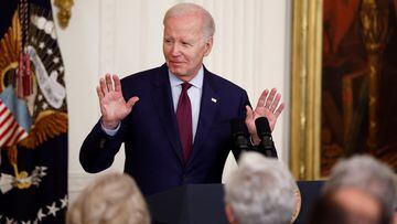 U.S. President Joe Biden announces that he is cutting his upcoming trip to Asia short and will return to Washington earlier than planned to continue U.S. debt ceiling negotiations, during his remarks at a Jewish American Heritage Month celebration at the White House in Washington, U.S., May 16, 2023. REUTERS/Evelyn Hockstein