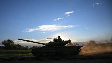 Ukrainian soldiers ride a tank in eastern Ukraine, on September 22, 2022, amid the Russian invasion of Ukraine. (Photo by Juan BARRETO / AFP) (Photo by JUAN BARRETO/AFP via Getty Images)