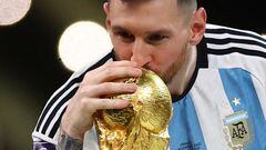 FILE PHOTO: Soccer Football - FIFA World Cup Qatar 2022 - Final - Argentina v France - Lusail Stadium, Lusail, Qatar - December 18, 2022 Argentina's Lionel Messi kisses the trophy as he celebrates winning the World Cup REUTERS/Carl Recine/File Photo