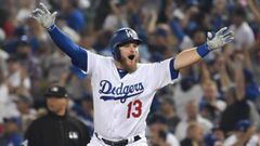 Max Muncy #13 of the Los Angeles Dodgers celebrates his eighteenth-inning walk-off home run to defeat the the Boston Red Sox 3-2 in Game Three of the 2018 World Series at Dodger Stadium on October 26, 2018 in Los Angeles, Cal