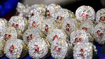 Counterfeit NFL merchandise seized by US Customs and Border Protection (CBP), including fake NFL Super Bowl Tampa Bay Buccaneers rings, is displayed during a press conference ahead of the Super Bowl at the Air Freight Federal Inspection Facility near Los 