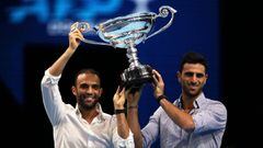 LONDON, ENGLAND - NOVEMBER 14: Juan Sebastian Cabal and Robert Farah of Colombia pose with their trophy after being announced as doubles world number one the during Day Five of the Nitto ATP World Tour Finals at The O2 Arena on November 14, 2019 in London, England. (Photo by James Chance/Getty Images)