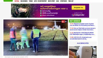 Het Laatste Nieuws muestra la imagen del accidentado avi&oacute;n de Mertens y de &eacute;l junto a los operarios del aeropuerto.