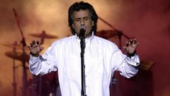 (FILES) Italian singer and composer Toto Cutugno performs late on July 26, 2002 at the Roman theater outside Tunis during the 38th international festival of Cartagena. Toto Cutugno, famous in Italy and abroad for his hit "Un Italiano vero" and his Eurovision victory in 1990 with "Insieme: 1992", died at the age of 80 on August 22, 2023 in Milan according to the Italian agency Ansa. (Photo by Fethi Belaid / AFP)
