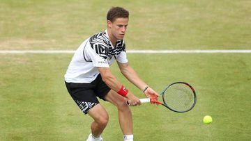 LONDON, ENGLAND - JUNE 21: Diego Schwartzman of Argentina plays a backhand during his Quarter-Final Singles Match against Daniil Medvedev of Russia during day Five of the Fever-Tree Championships at Queens Club on June 21, 2019 in London, United Kingdom. (Photo by Alex Pantling/Getty Images)