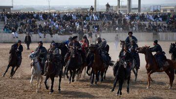 Afghan horsemen during a game of the traditional sport of buzkashi. 