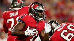 TAMPA, FLORIDA - OCTOBER 27: Leonard Fournette #7 of the Tampa Bay Buccaneers carries the ball against the Baltimore Ravens during the first quarter at Raymond James Stadium on October 27, 2022 in Tampa, Florida.   Mike Ehrmann/Getty Images/AFP