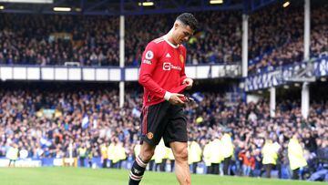 Manchester United's Cristiano Ronaldo assesses the cuts on his leg after the final whistle in the Premier League match at Goodison Park, Liverpool. Picture date: Saturday April 9, 2022. (Photo by Martin Rickett/PA Images via Getty Images)