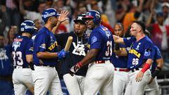 Venezuela's outfielder #31 Yasiel Puig celebrates after completing a run during the Caribbean Series semifinal baseball game between Curacao and Venezuela at LoanDepot Park in Miami, Florida, on February 8, 2024. (Photo by Chandan Khanna / AFP)