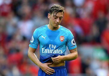 Mesut Ozil of Arenal is dejected after the Premier League match between Liverpool and Arsenal