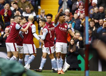 Aston Villa's Ollie Watkins celebrates scoring their first goal with teammates.