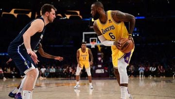 Luka Doncic faces off with LeBron James in a game against the Lakers.