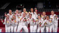 This handout photo released by the Olympic Information Services (OIS) of the International Olympic Committee (IOC) and taken on September 5, 2021 shows gold medallists USA posing during the victory ceremony of the sitting volleyball womenx92s event at Mak