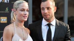 (FILES) This picture taken on November 4, 2012 during the Feather Awards held at Melrose Arch in Johannesburg shows South Africa's Olympic sprint star Oscar Pistorius and his model girlfriend Reeva Steenkamp. The mother of Reeva Steenkamp, a South African model killed by ex-Olympian Oscar Pistorius, is the one "serving a life sentence", she said in a statement on January 5, 2024 ahead of his release from prison. (Photo by LUCKY NXUMALO / AFP)