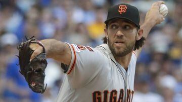 San Francisco Giants starting pitcher Madison Bumgarner throws during the first inning of a baseball game against the Milwaukee Brewers Saturday, July 13, 2019, in Milwaukee. (AP Photo/Morry Gash)