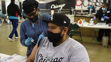 CHICAGO, ILLINOIS - MAY 29: Louie Perales is given the J&amp;J COVID vaccine in coordination with the Cook County Health Dept. and the Chicago White Sox. Recipients were given a $25 card for discounts on concessions before Game One of a doubleheader at Gu