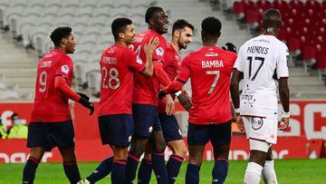 Lille&#039;s Belgian midfielder Amadou Onana  (C) reacts after Lorient scored and own goal during the French L1 football match between Lille (LOSC) and Lorient (FCL) at the Pierre Mauroy Stadium Villeneuve-d&#039;Ascq, northern France, on January 19, 2022