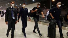 Serbian tennis player Novak Djokovic walks in Melbourne Airport before boarding a flight, after the Federal Court upheld a government decision to cancel his visa to play in the Australian Open, in Melbourne, Australia, January 16, 2022. REUTERS/Loren Elli