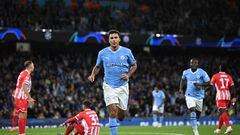 Manchester City's Spanish midfielder #16 Rodri celebrates scoring his team thrid goal during the UEFA Champions League Group G football match between Manchester City and FC Crvena Zvezda (Red Star Belgrade) at the Etihad Stadium in Manchester, north west England, on September 19, 2023. (Photo by Oli SCARFF / AFP)