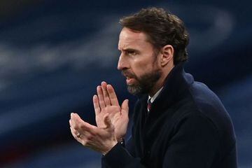(FILES) In this file photo taken on March 31, 2021 England's manager Gareth Southgate reacts on the touchline during the FIFA World Cup Qatar 2022 Group I qualification football match between England and Poland at Wembley Stadium