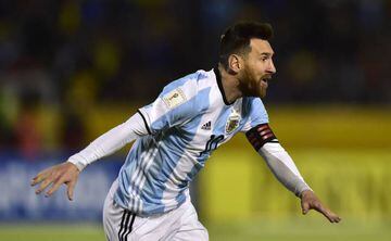 Argentina's Lionel Messi celebrates after scoring his third goal against Ecuador during their 2018 World Cup qualifier football match in Quito, on October 10, 2017.