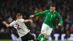 Dublin , Ireland - 22 March 2023; Matt Doherty of Republic of Ireland is tackled by Vladislavs Sorokins of Latvia during the international friendly match between Republic of Ireland and Latvia at the Aviva Stadium in Dublin. (Photo By Seb Daly/Sportsfile via Getty Images)