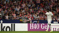 Real Madrid's Brazilian forward Vinicius Junior gestures toward the public during the Spanish League football match between Club Atletico de Madrid and Real Madrid CF at the Wanda Metropolitano stadium in Madrid on September 18, 2022. (Photo by OSCAR DEL POZO / AFP)