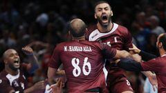 Qatar&#039;s right back Mustafa Alsatialkrad (Top) and Qatar&#039;s centre back Mahmoud Hassaballa (C) celebrate after Qatar defeated Germany in the 25th IHF Men&#039;s World Championship 2017 eighth final handball match Germany vs Qatar on January 22, 2017 at the AccorHotels Arena in Paris. / AFP PHOTO / THOMAS SAMSON